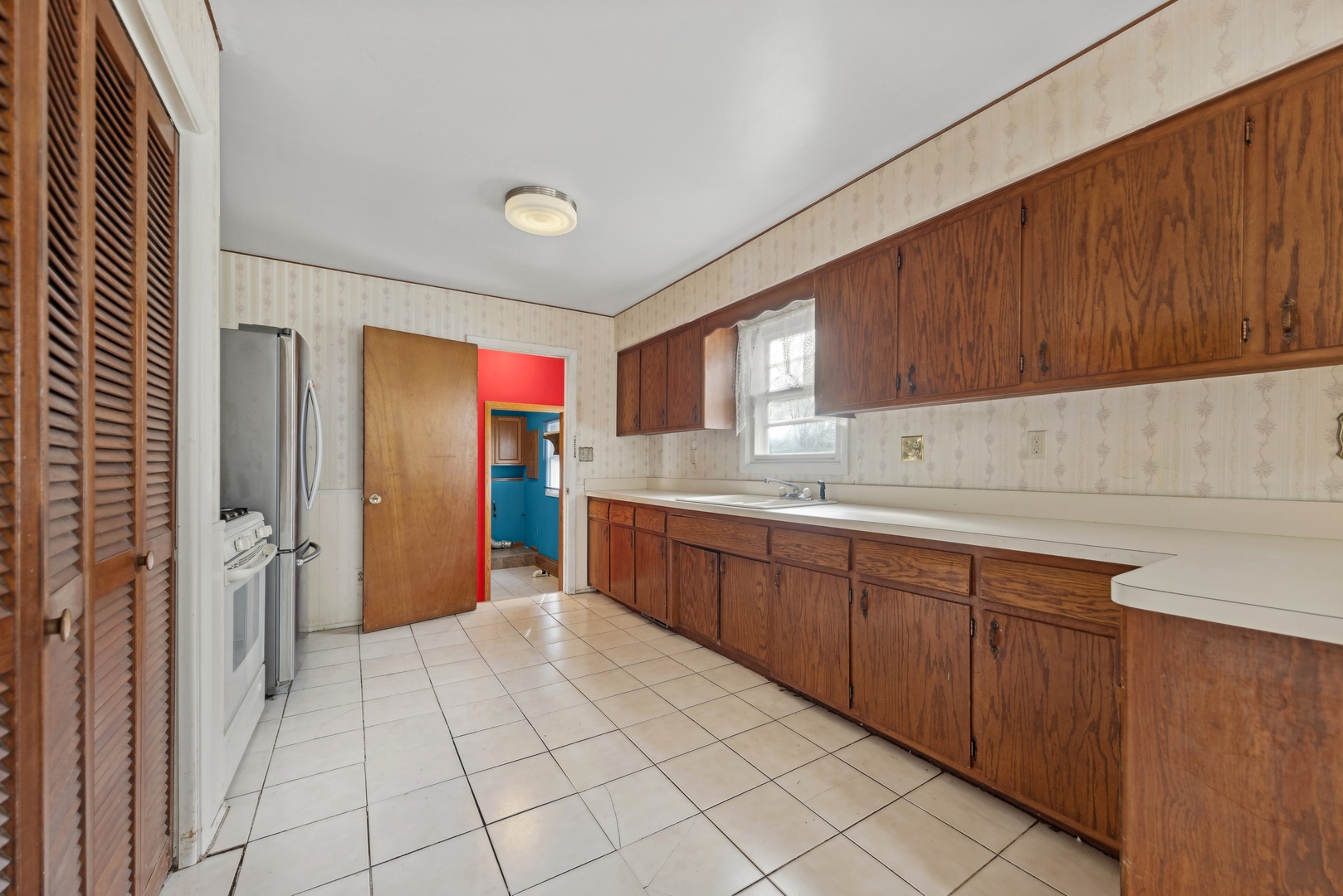 213 South Anderson Road New Lenox, IL 60451 - Photo 12 of 32 a kitchen with stainless steel appliances granite countertop a refrigerator and a sink