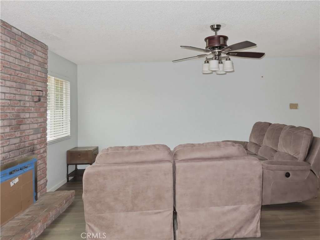 4409 Challen Avenue Riverside, CA 92503 - Photo 7 of 31 a living room with furniture and a window