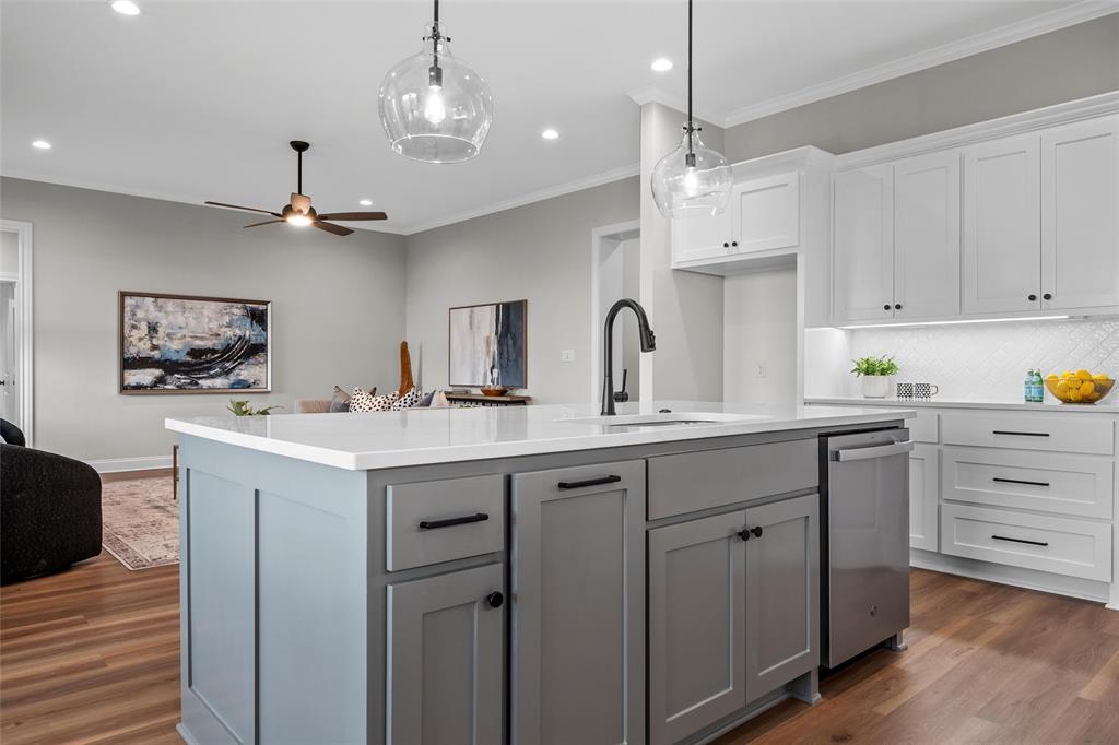 1320 Promised Land Road Hewitt, TX 76643 - Photo 26 of 26 a kitchen with a sink cabinets and wooden floor
