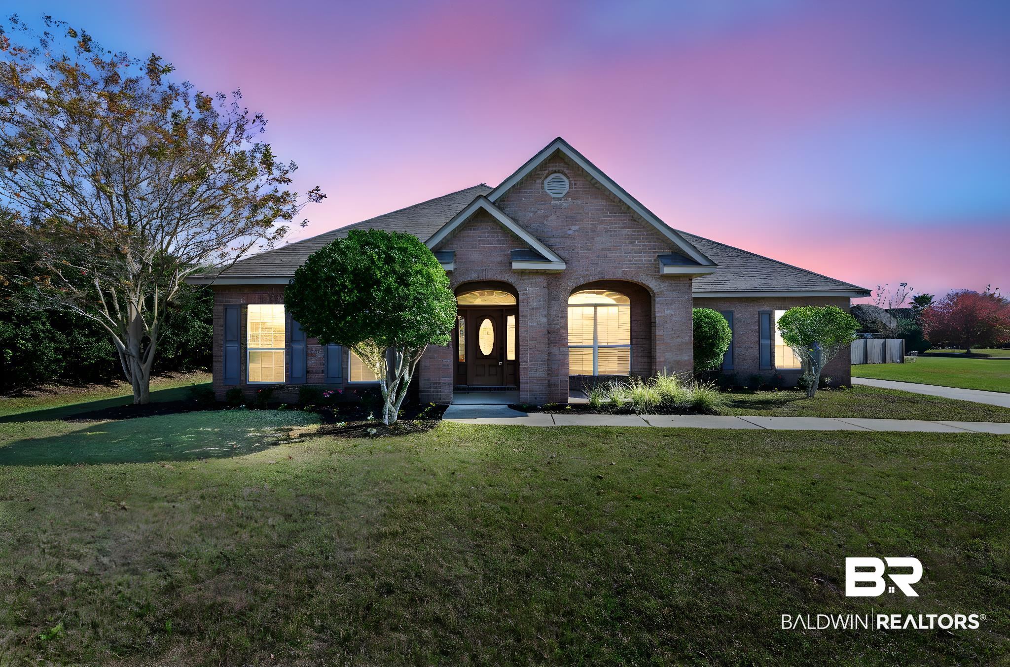 25234 Fairfax Road Daphne, AL 36526 - Photo 1 of 45 View of front of house with a yard, brick siding, and a shingled roof