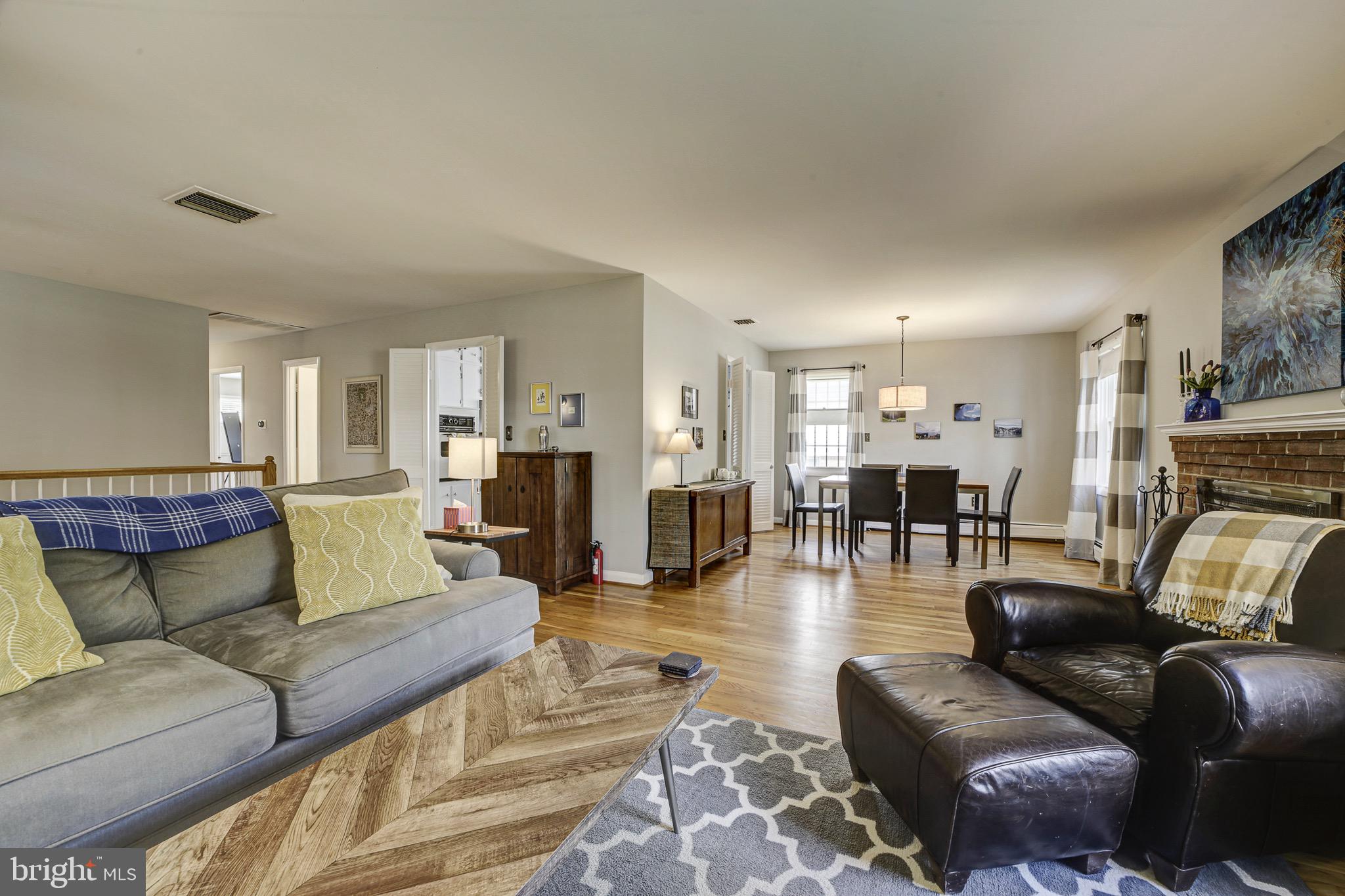 6326 Rockhurst Road Bethesda, MD 20817 - Photo 1 of 32 a living room with furniture and a wooden floor