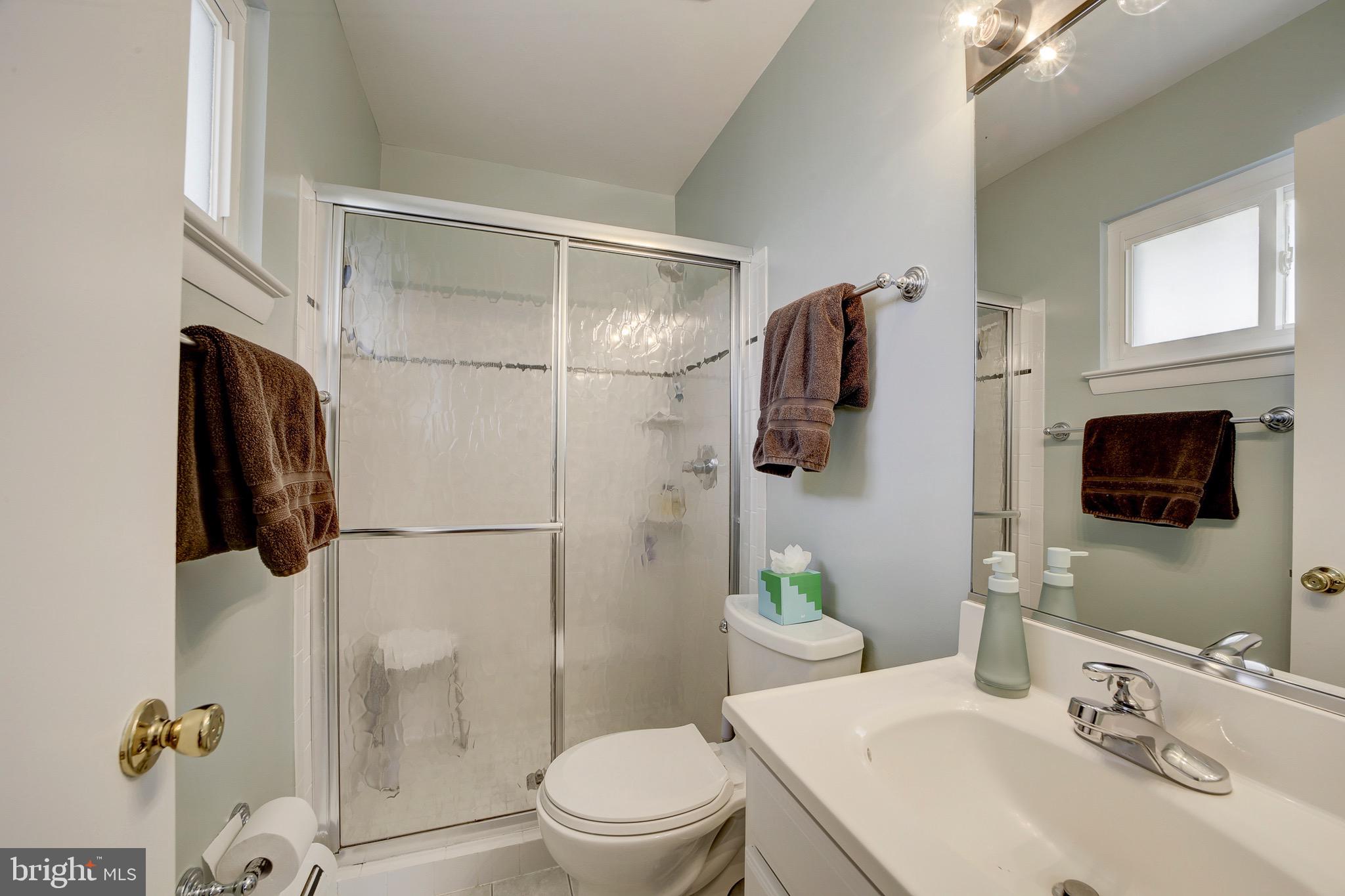 6326 Rockhurst Road Bethesda, MD 20817 - Photo 19 of 32 a bathroom with a sink toilet and shower