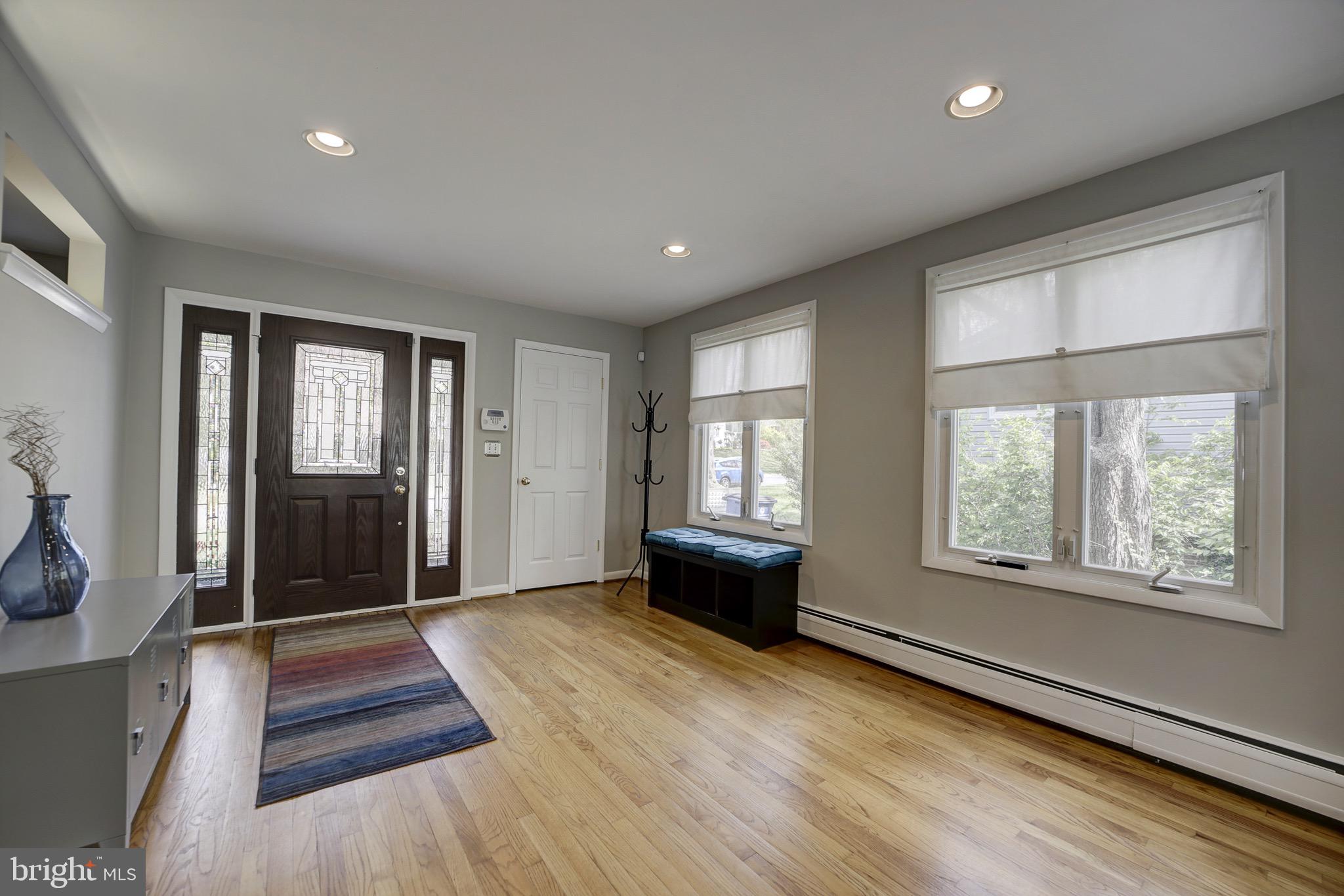 6326 Rockhurst Road Bethesda, MD 20817 - Photo 5 of 32 a view of an empty room with wooden floor and a window