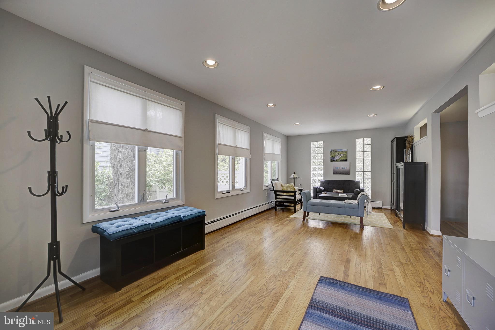 6326 Rockhurst Road Bethesda, MD 20817 - Photo 6 of 32 a living room with furniture and a large window