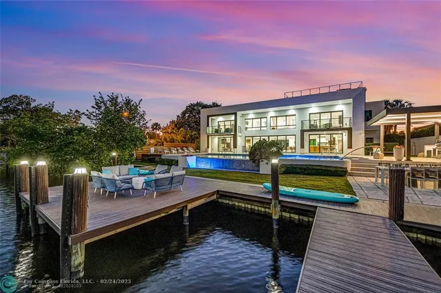 a view of a balcony with chairs