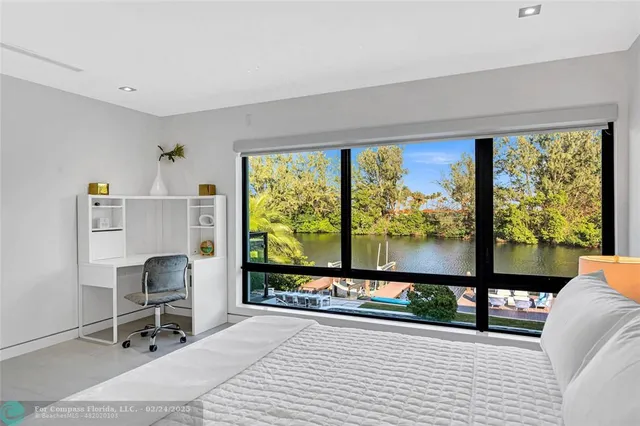 a workspace with furniture and window