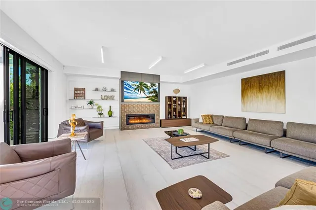 a living room with furniture and a couch