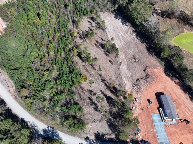 a view of a yard covered with snow