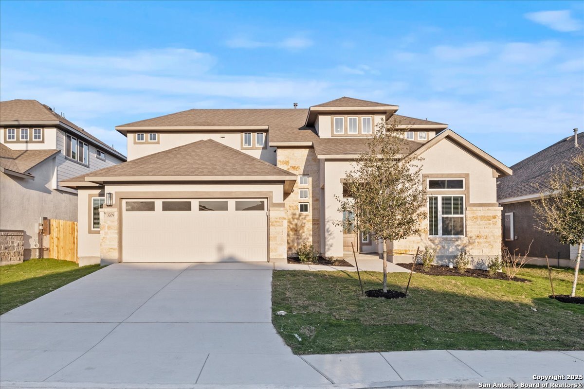 3709 Pin Oak Hills Seguin, TX 78155 - Photo 1 of 1 a front view of a house with garden