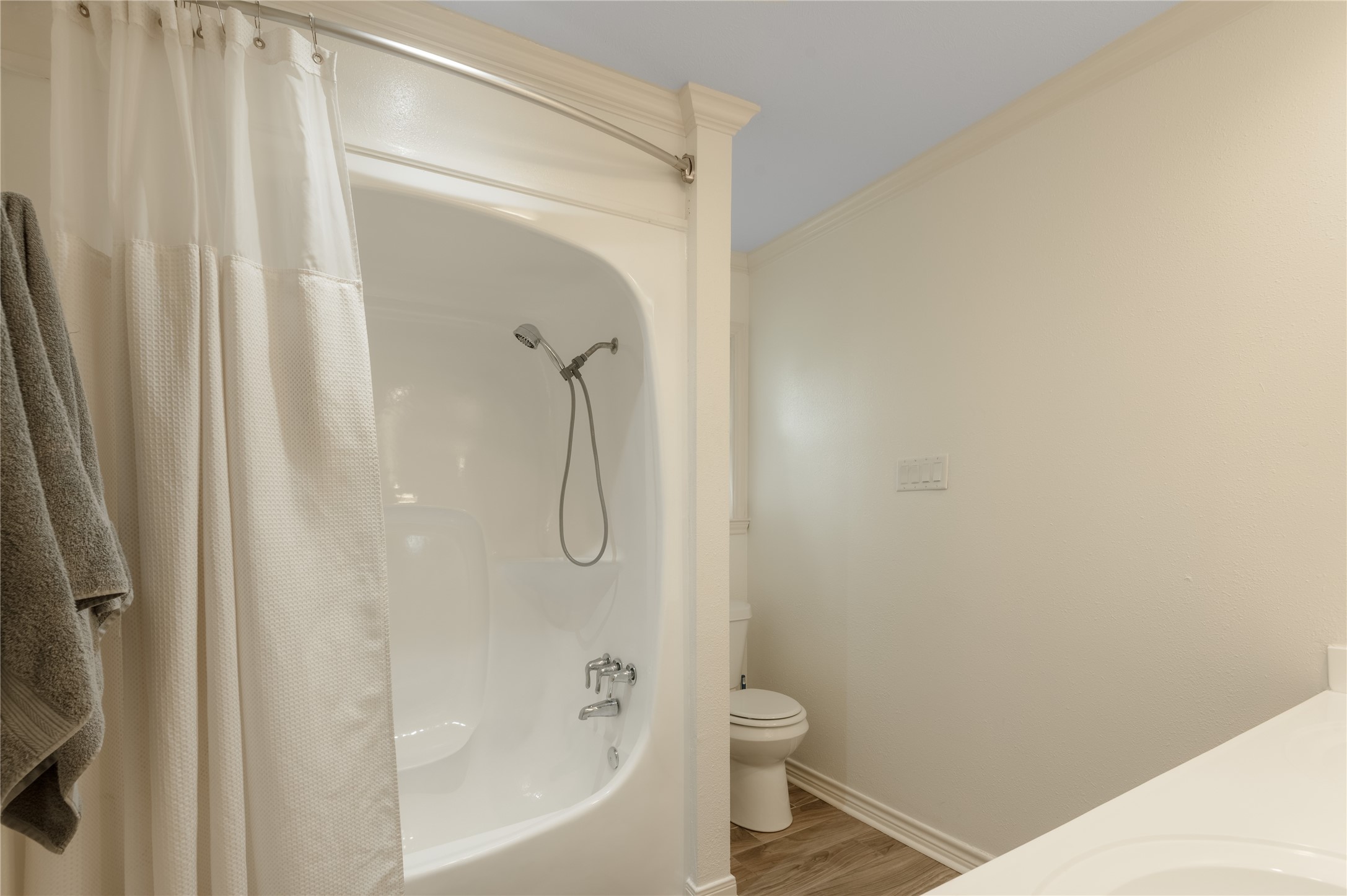 758 Wire Road Huntsville, TX 77320 - Photo 14 of 44 a bathroom with a shower and a toilet