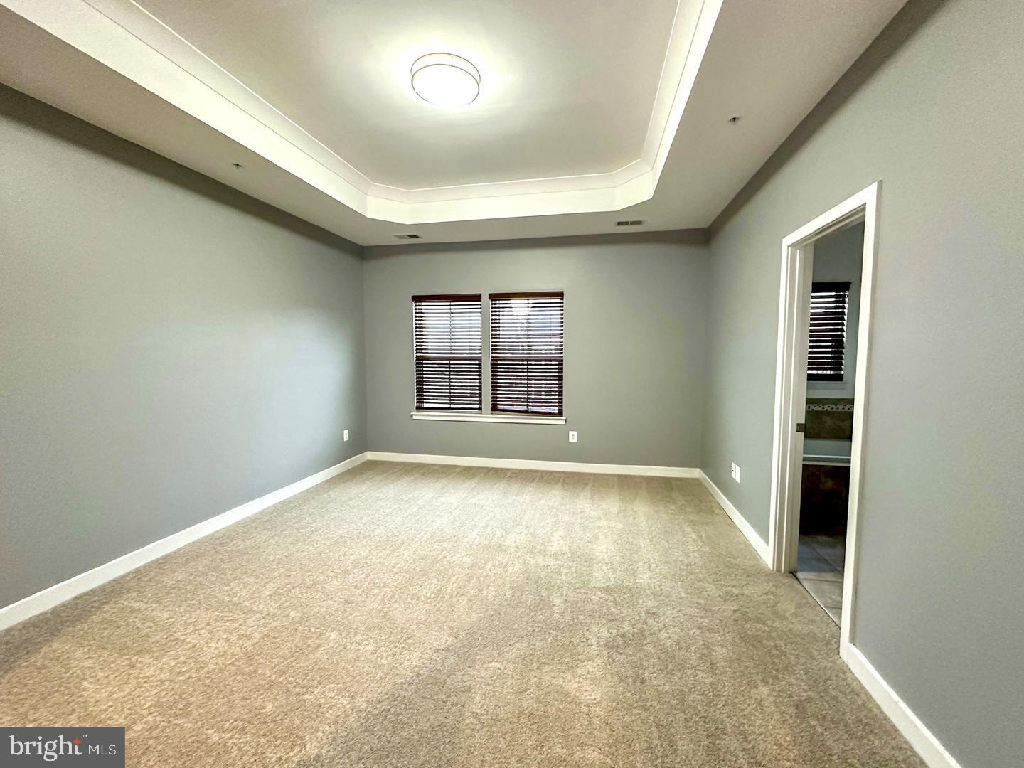 601 Colindale Street Middle River, MD 21220 - Photo 5 of 17 an empty room with a windows and closet