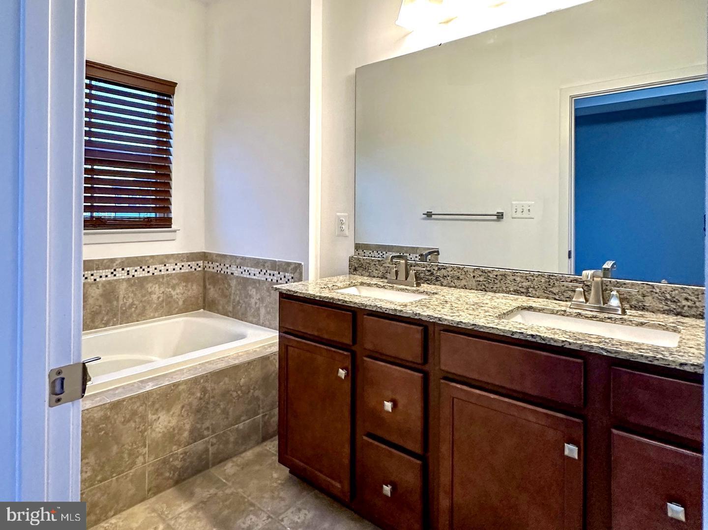 601 Colindale Street Middle River, MD 21220 - Photo 6 of 17 a bathroom with a sink and a bathtub