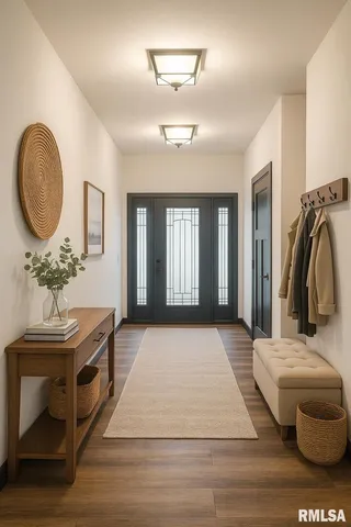 a en suite bathroom with a double vanity sink and a mirror