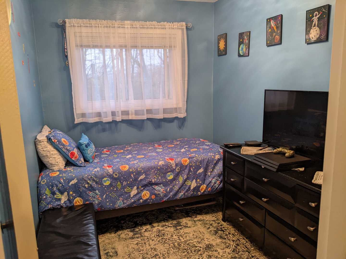 10015 Frontage Road, Unit B Skokie, IL 60077 - Photo 5 of 20 a bed room with a bed and a television