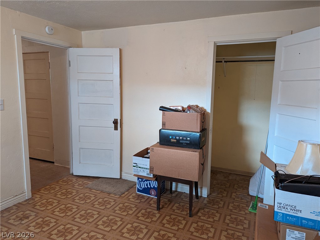 561 Main Street Caliente, NV 89008 - Photo 25 of 32 Bedroom featuring light floors and a closet