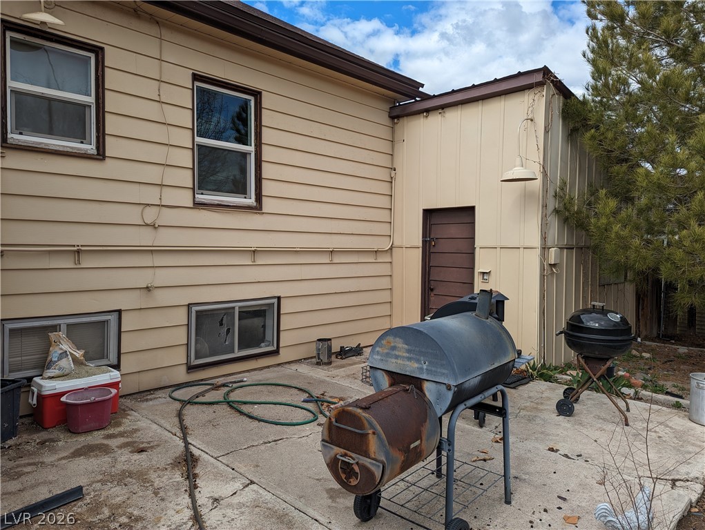 561 Main Street Caliente, NV 89008 - Photo 30 of 32 View of patio with area for grilling