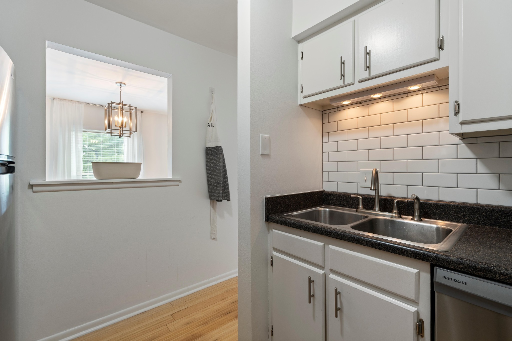325 Summit Ridge Circle Nashville, TN 37215 - Photo 12 of 25 a kitchen with a sink and cabinets