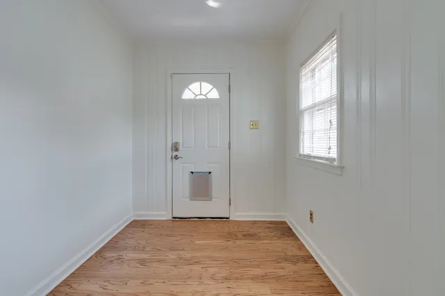 an empty room with window