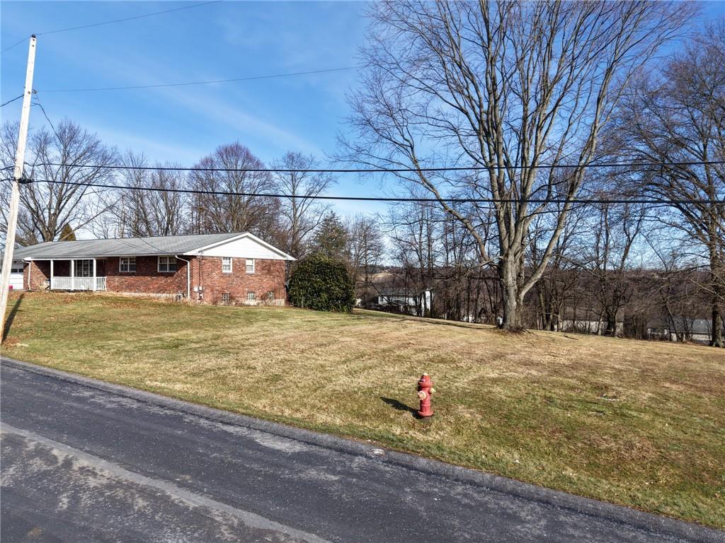 0 4th Street Irwin, PA 15642 - Photo 3 of 25 a view of a yard with large trees
