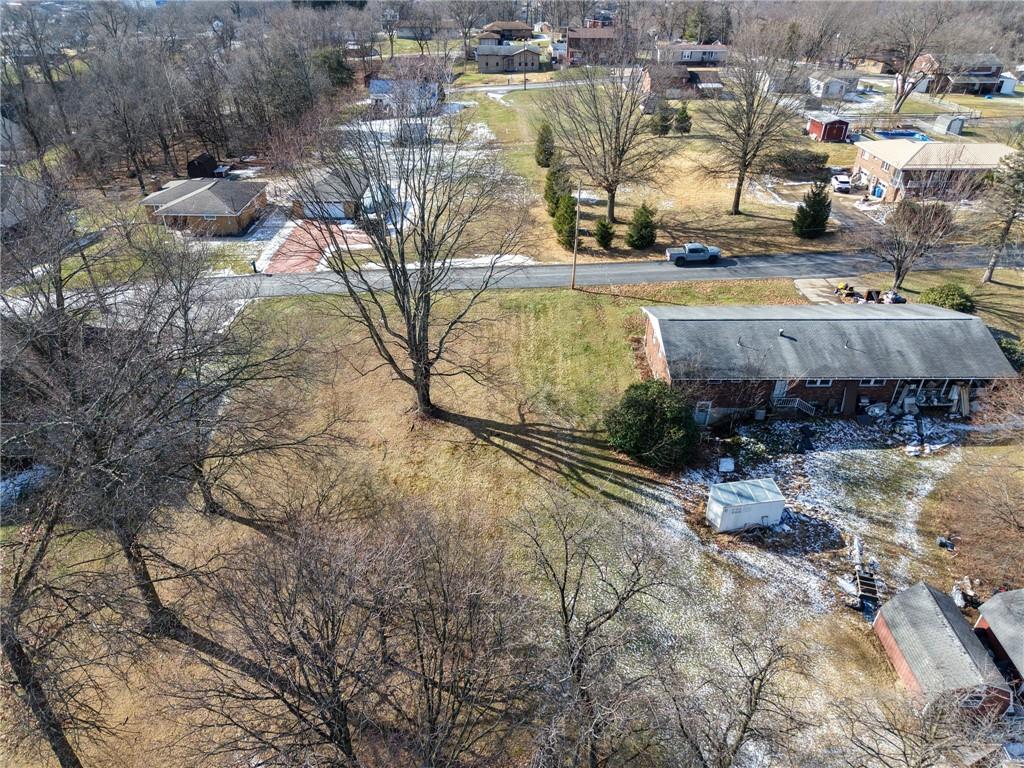 0 4th Street Irwin, PA 15642 - Photo 4 of 25 a view of a swimming pool with a yard and lake view