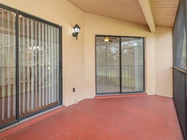 a view of a room with a large window