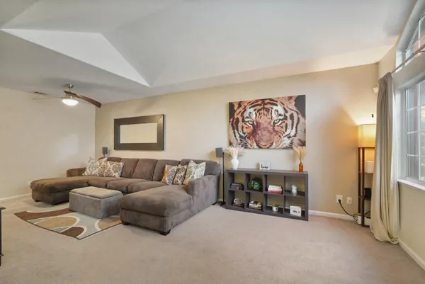 a living room with furniture and a couch