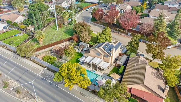 an aerial view of a house with a garden