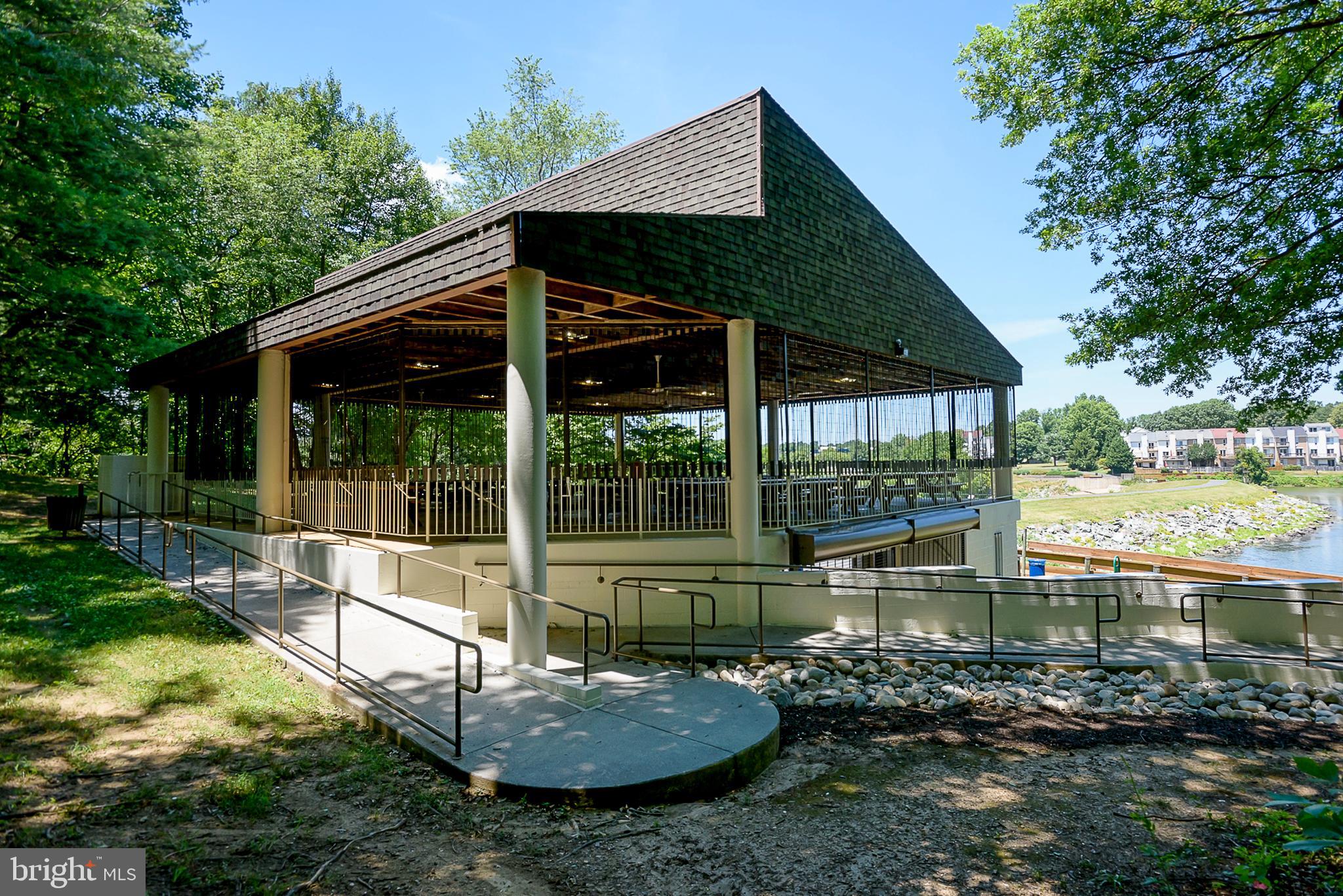 5232 West Running Brook Road, Unit 101 Columbia, MD 21044 - Photo 35 of 39 a view of a house with backyard from a patio
