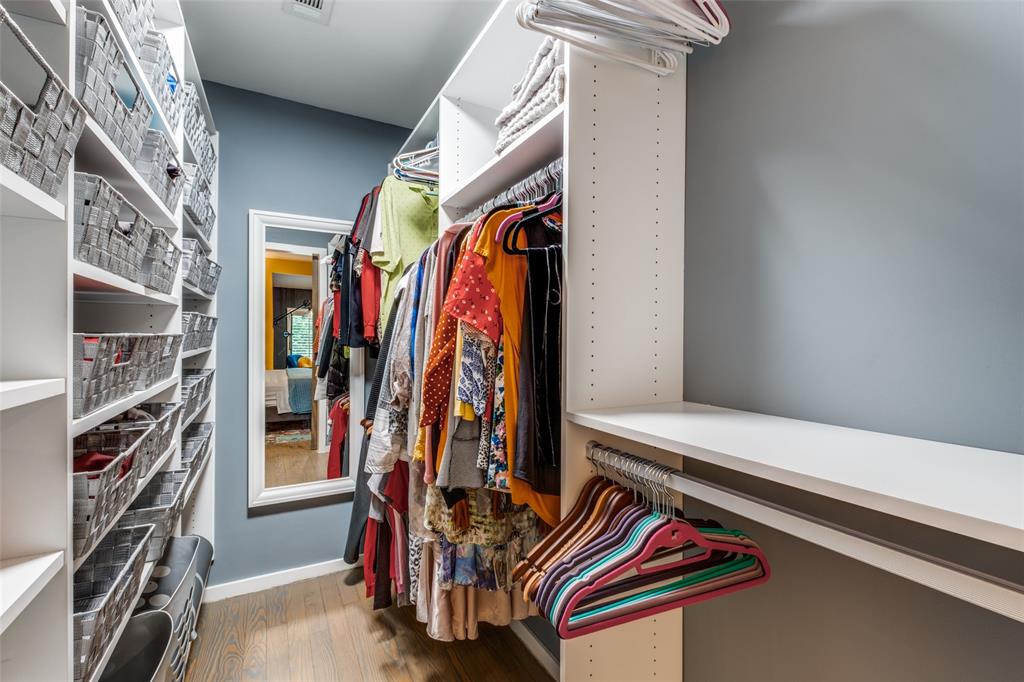 4231 Travis Street, Unit 17 Dallas, TX 75205 - Photo 22 of 26 a view of walk in closet with clothes