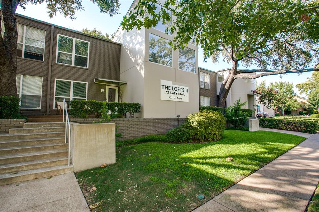 4231 Travis Street, Unit 17 Dallas, TX 75205 - Photo 26 of 26 a front view of a house with garden