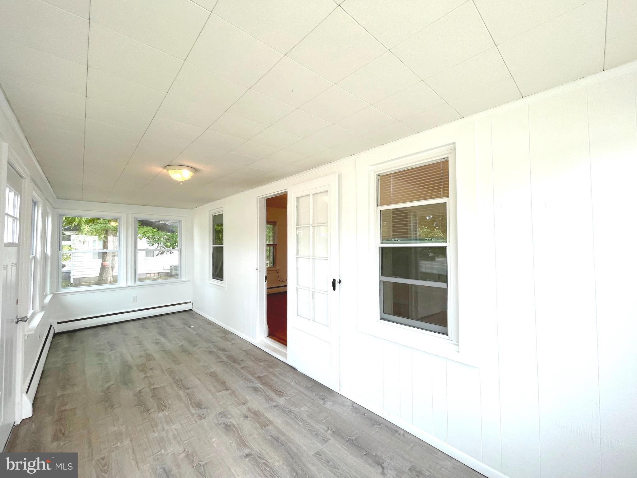 590 Hallowing Point Road Prince Frederick, MD 20678 - Photo 5 of 23 a view of an empty room with a window