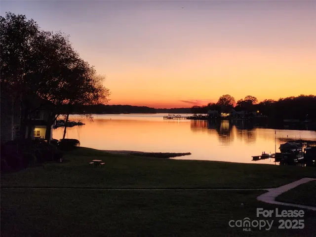 a view of outside space and a lake