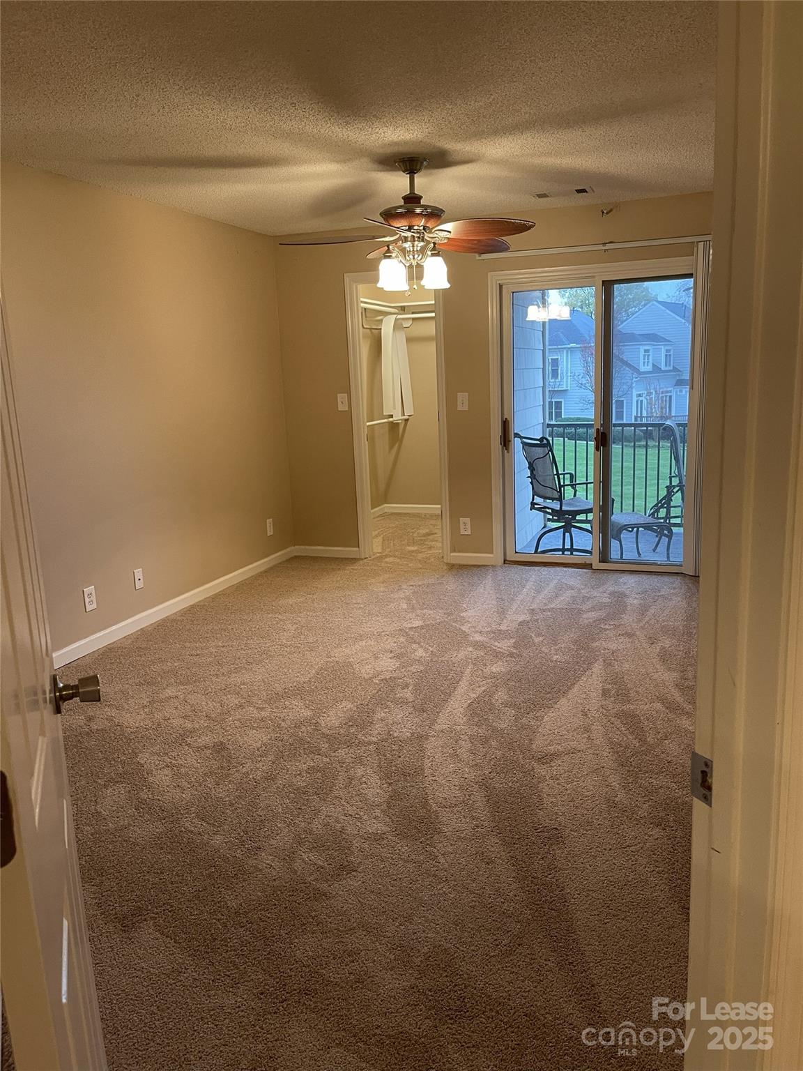 18701 Nautical Drive, Unit 203 Cornelius, NC 28031 - Photo 6 of 13 a view of an empty room with a window
