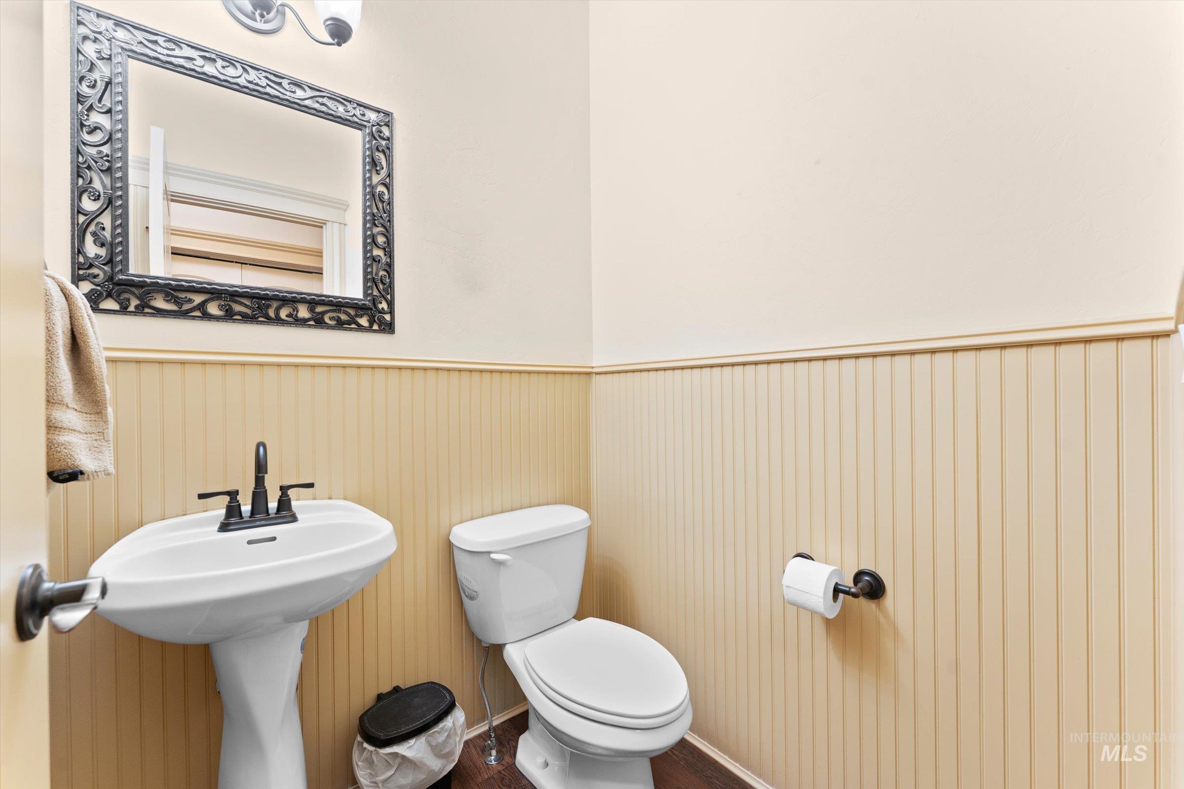 176 East Breinholt Street Meridian, ID 83646 - Photo 12 of 39 Bathroom featuring wainscoting and toilet