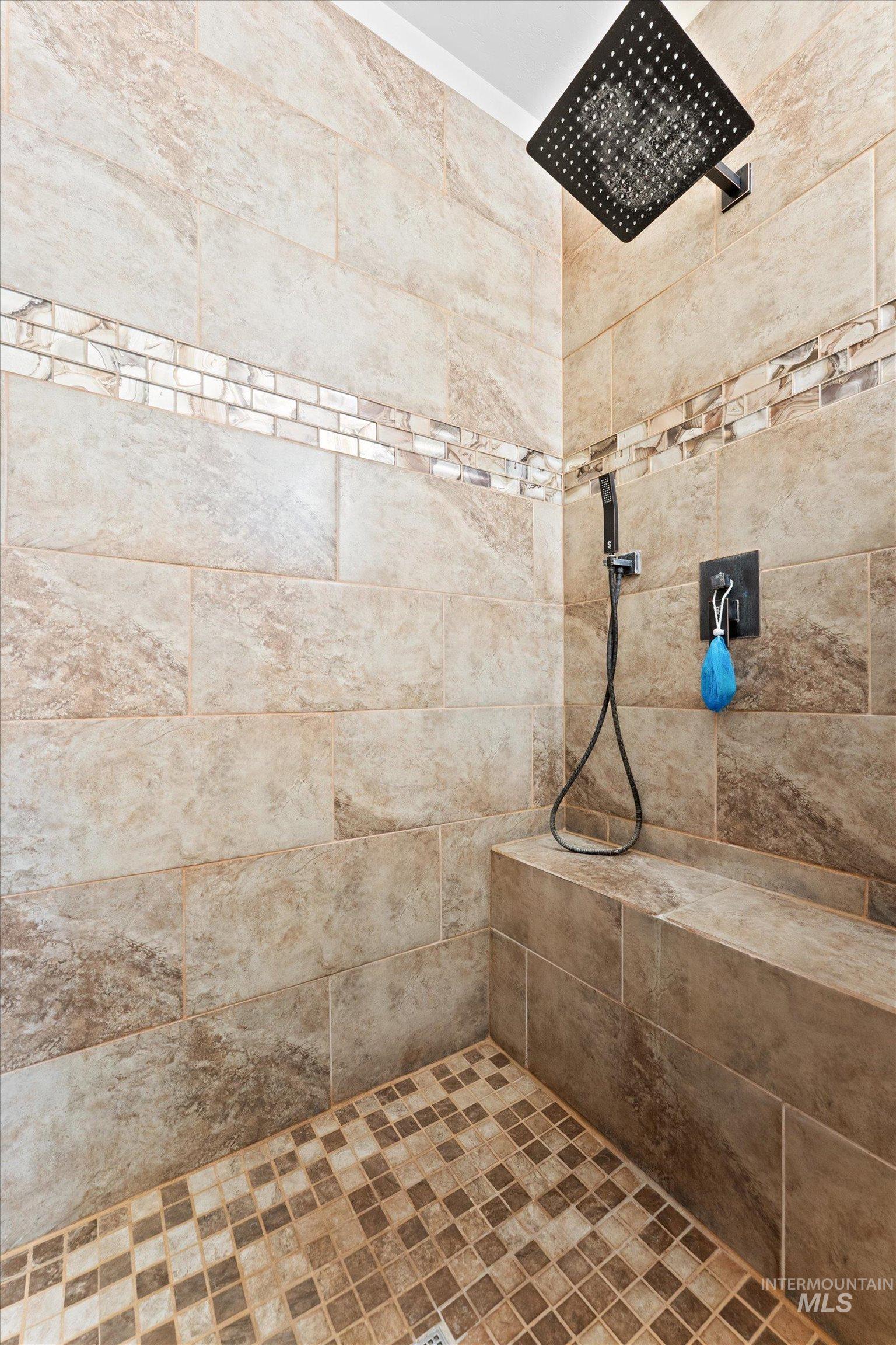 176 East Breinholt Street Meridian, ID 83646 - Photo 17 of 39 Bathroom featuring a tile shower