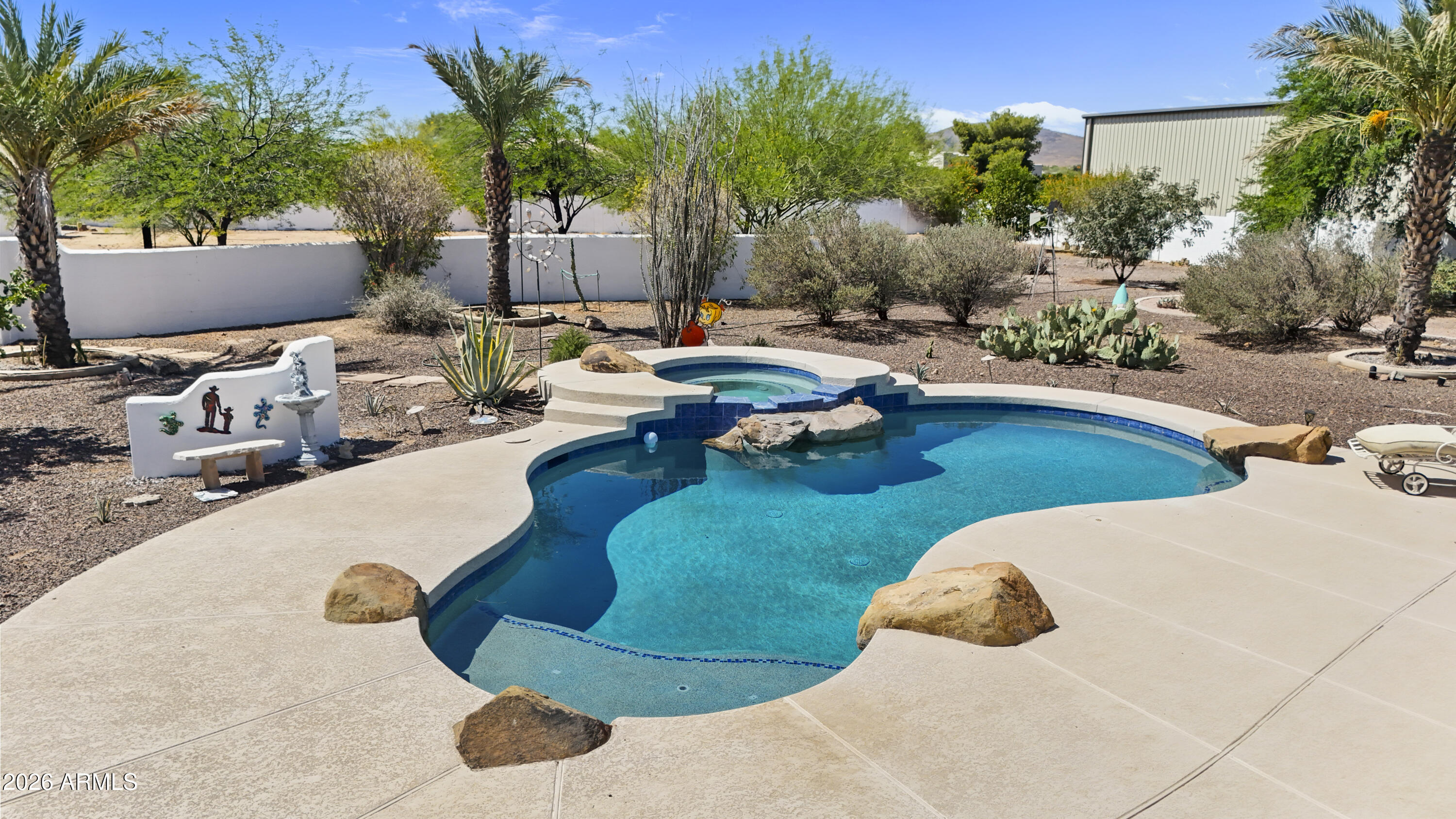 605 West Ridgecrest Road Phoenix, AZ 85086 - Photo 34 of 40 a view of a swimming pool with lounge chairs