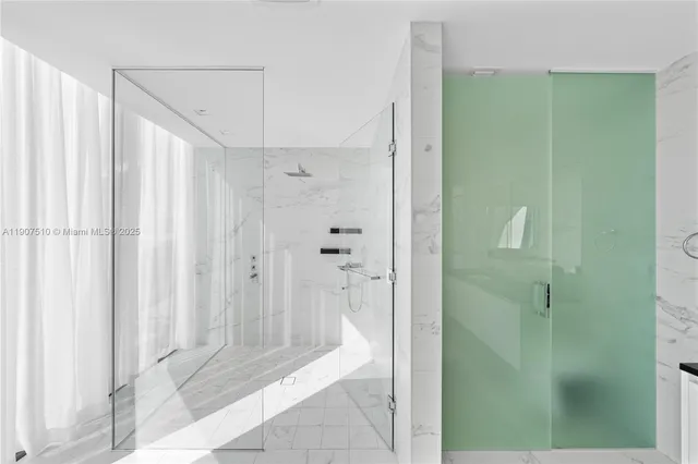 a kitchen with refrigerator and countertop