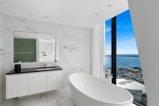 a living room with furniture and a piano