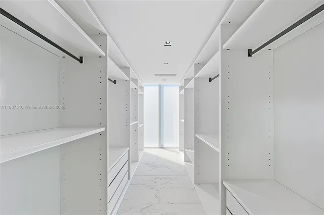 a view of a vase of flowers sitting on a table