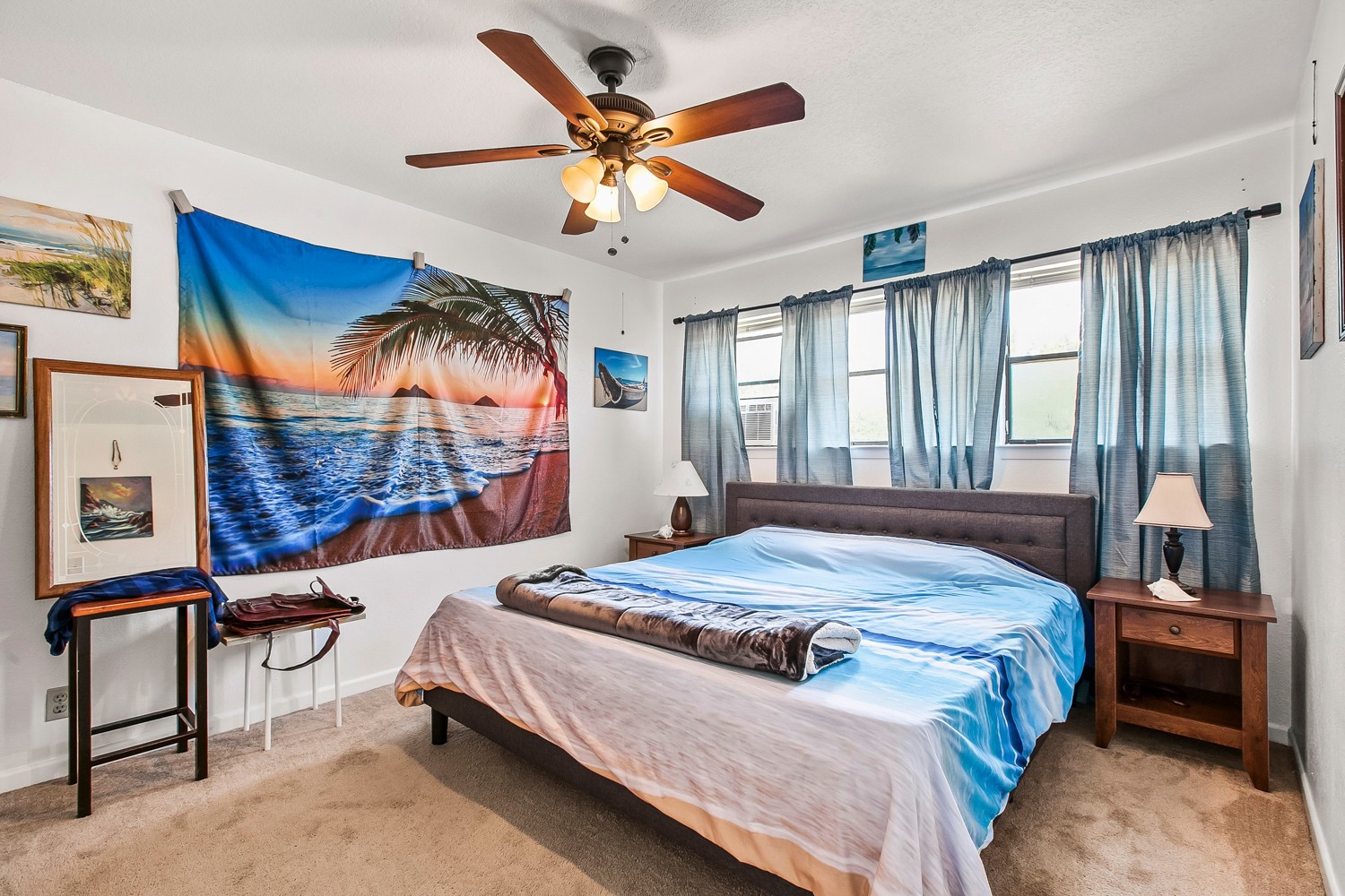 6029 Old Fredericksburg Road, Unit A Austin, TX 78749 - Photo 5 of 20 a bedroom with a bed and a chandelier