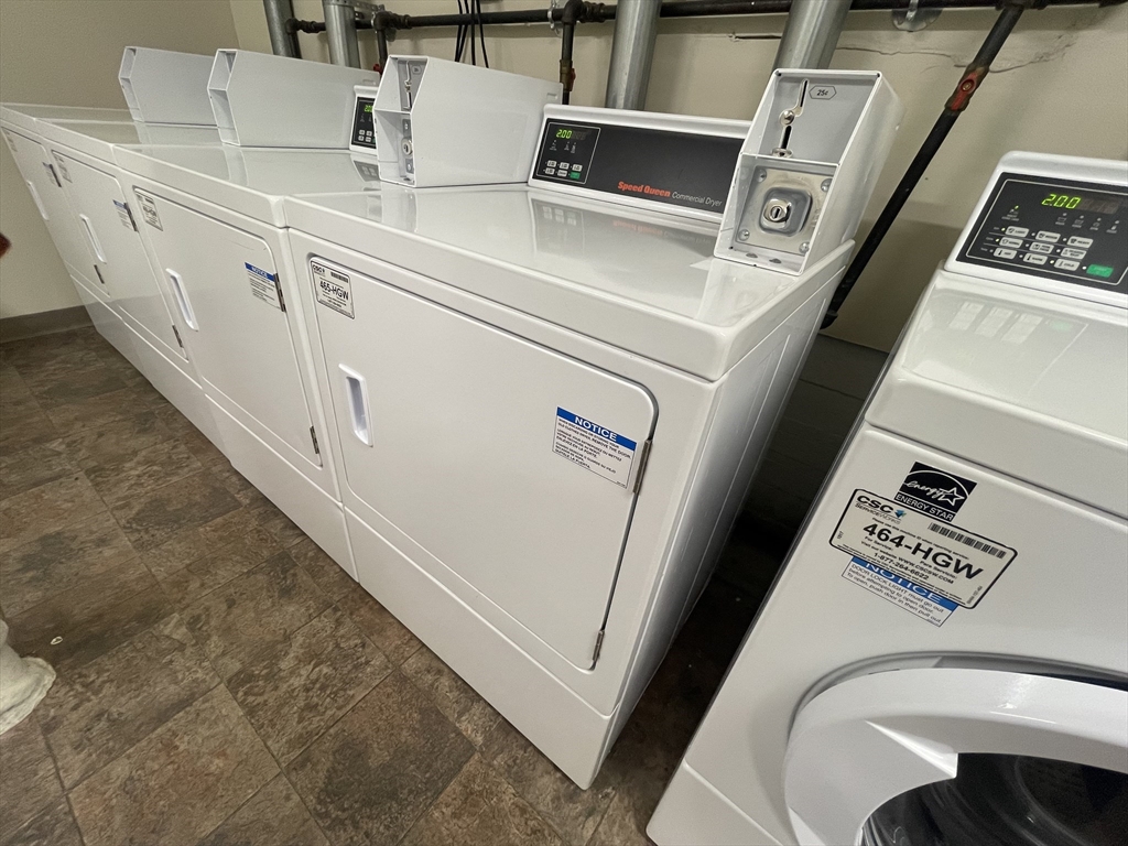 660 Huntington Avenue, Unit 23 Boston, MA 02115 - Photo 15 of 23 a utility room with dryer and washer
