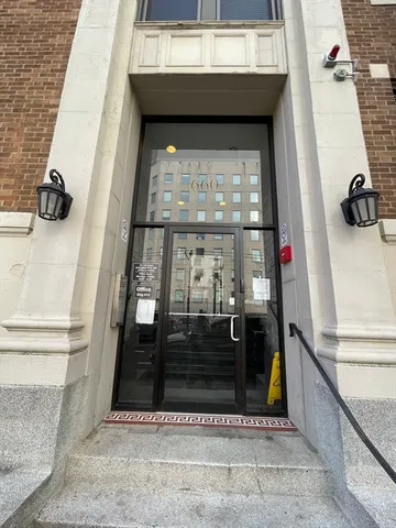 a view of a building with a street