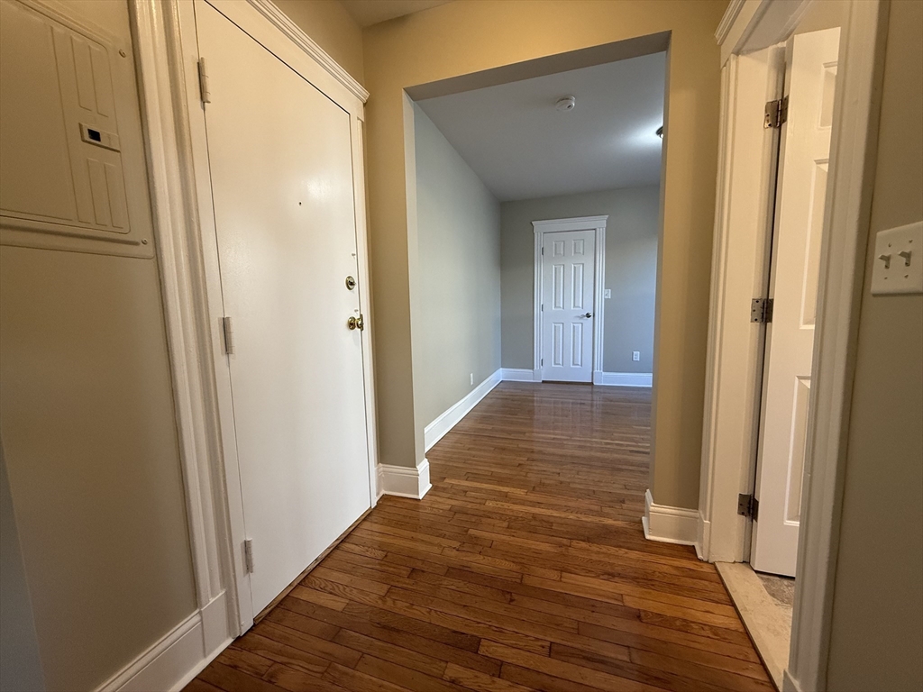 660 Huntington Avenue, Unit 23 Boston, MA 02115 - Photo 10 of 23 a view of a hallway with wooden floor