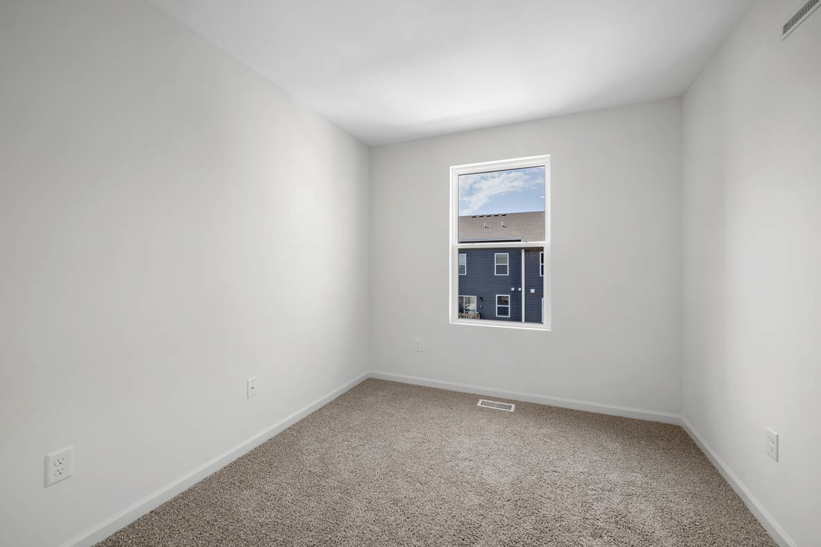 1478 Yosemite Way Pingree Grove, IL 60140 - Photo 13 of 18 a view of an empty room with a window