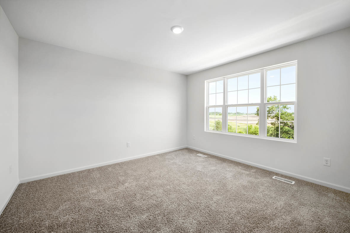 1478 Yosemite Way Pingree Grove, IL 60140 - Photo 15 of 18 an empty room with windows