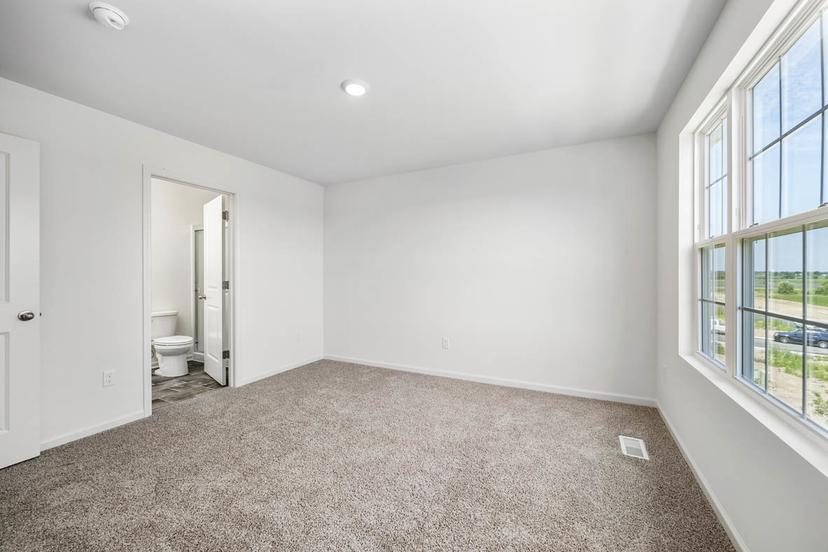 1478 Yosemite Way Pingree Grove, IL 60140 - Photo 16 of 18 an empty room with windows