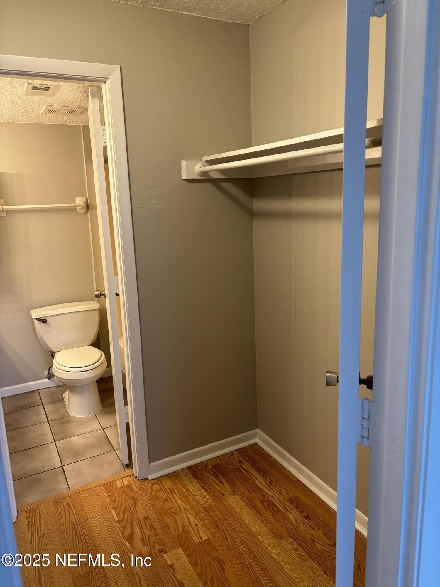 1000 3rd Street, Unit D Neptune Beach, FL 32266 - Photo 29 of 46 a bathroom with a toilet and a shower