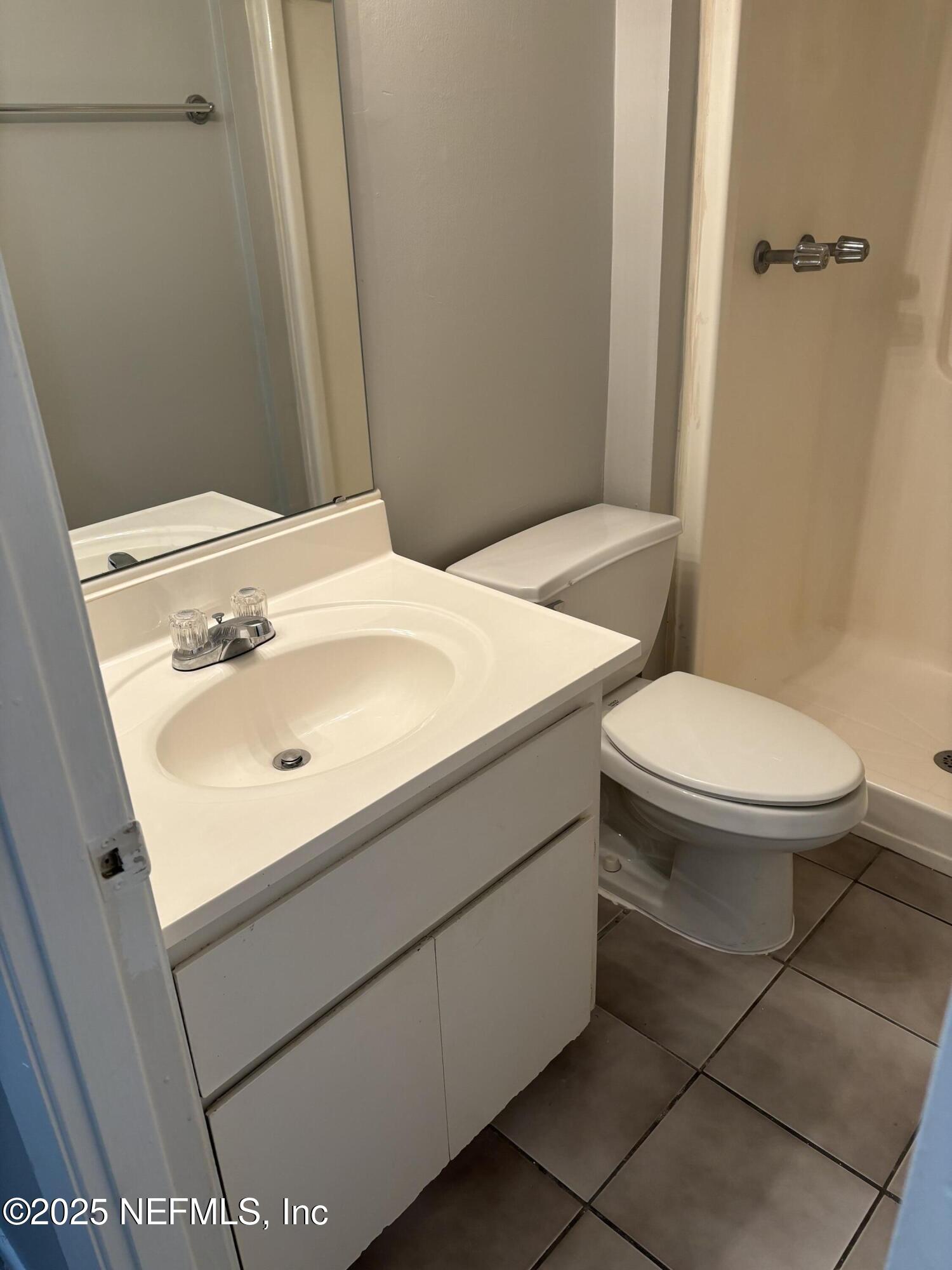 1000 3rd Street, Unit D Neptune Beach, FL 32266 - Photo 41 of 46 a bathroom with a sink toilet and shower