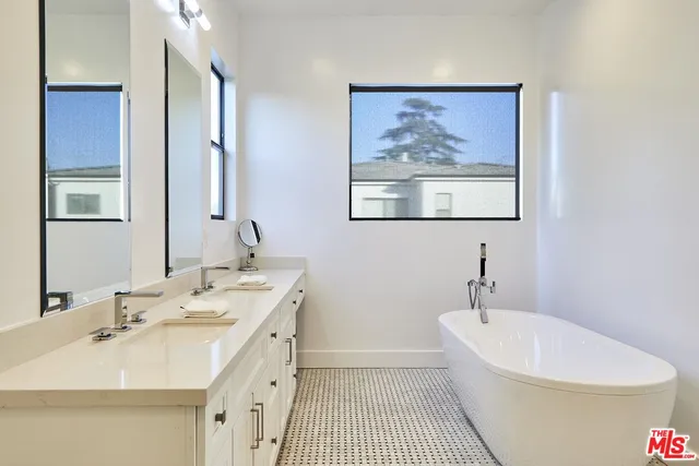 a bathroom with a sink a toilet and a bathtub