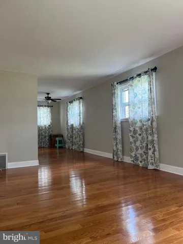 a view of small space with wooden floor